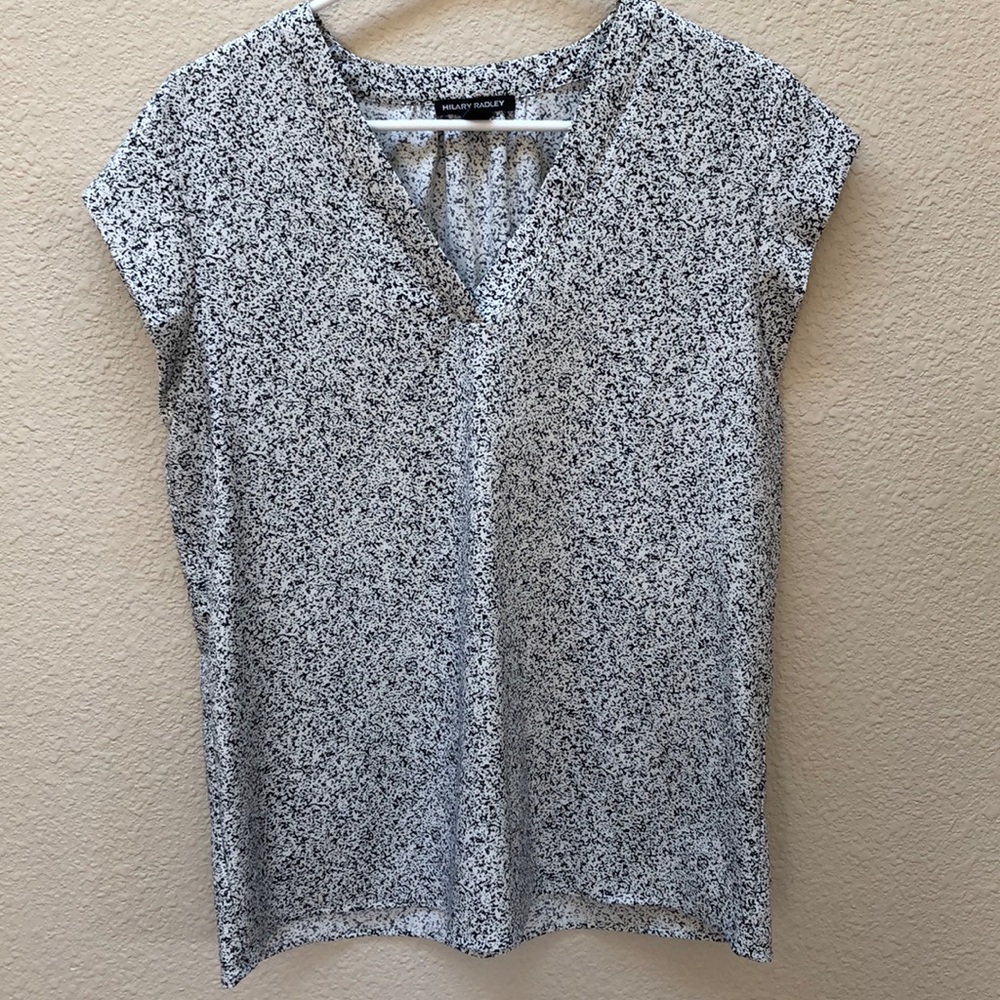 White speckled top with V-neck. Perfect for summer